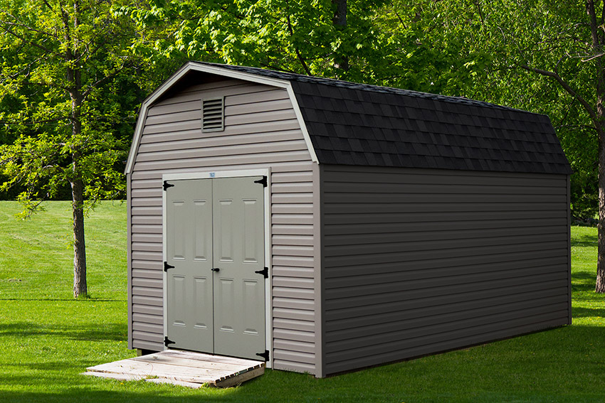 The best backyard shed for a zero turn mower shown in brown